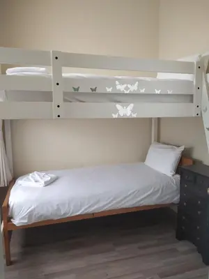 a bedroom with a bunk bed with two bunk beds at Glasgow city Charlotte service Aparments in Glasgow