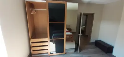 a room with a closet with a glass door at Highland Haven, Glencoe in Ballachulish