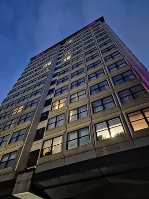 a tall building with lots of windows at Britannia Inn Glasgow in Glasgow