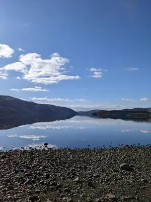 a view of a body of water with mountains at The Posting House in Kilchrenan