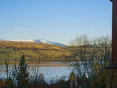 a view of a lake with mountains in the background at Rosmuire in Rhu