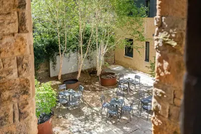 an overhead view of a patio with chairs and trees at Grove House Hotel in Edinburgh