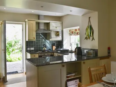 a kitchen with a sink and a counter top at Westerton Lodge - Srrh in Crieff