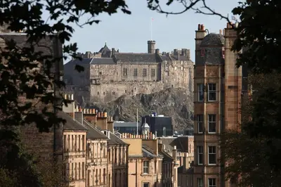 a view of a city with a castle in the background at Bruntsfield Hotel in Edinburgh
