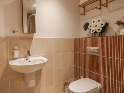 a bathroom with a sink and a toilet at 5 St Mary's Church in Moffat