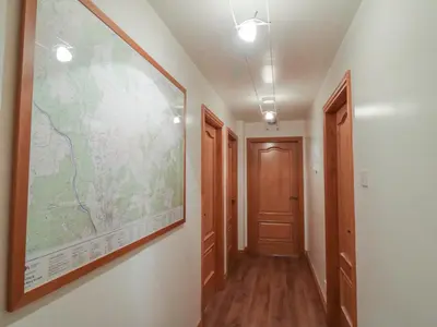 a large map hanging on a wall in a hallway at 5 St Mary's Church in Moffat