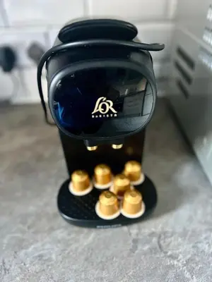a blender with gold coins on top of it at 3 Bedroom harbourside apartment, Queensferry, 10 miles from Edinburgh in Queensferry
