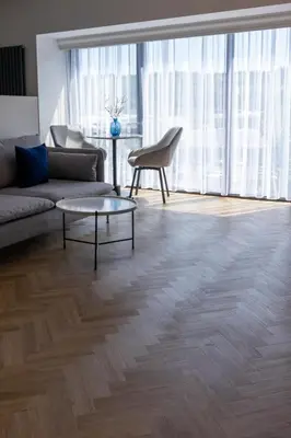 a living room with a couch and a coffee table at Oban Apartments in Oban