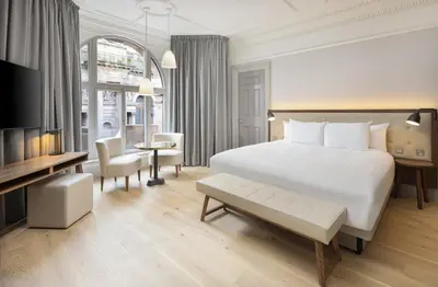 a hotel room with a bed and a tv at AC Hotel by Marriott Glasgow in Glasgow