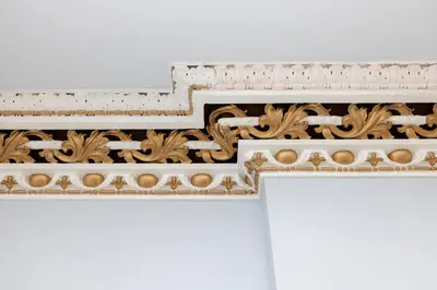 a close up of the ornate trim on a building at Deluxe 3-bedroom Apartment on Princes Street overlooking Edinburgh Castle in Edinburgh