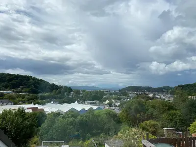 a view of a town under a cloudy sky at Benollis in Oban