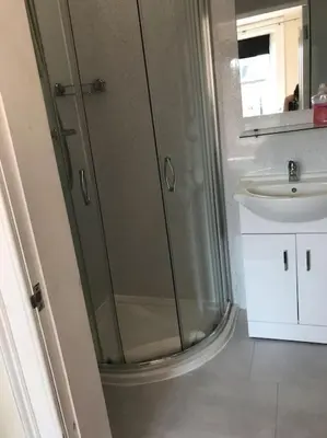 a bathroom with a shower and a sink at Central 3 bedrooms apartment for upto 6 in Edinburgh