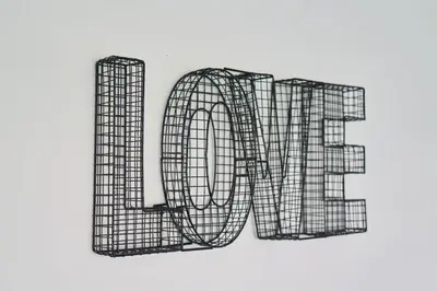 a rendering of the word love in black at Woodside Apartment in Coatbridge