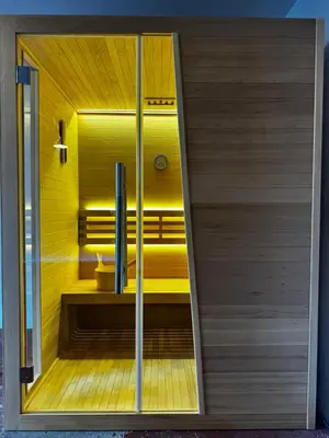 a bathroom with a shower with a yellow wall at Ash, Birch and Rowan Self Catering Cabins in Onich