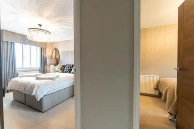 a bedroom with a bed and a window at 33 Dunbar Court Gleneagles Village in Auchterarder
