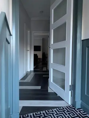 a hallway with an open door to a room at Hillview in Oban