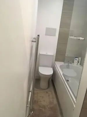 a small bathroom with a toilet and a sink at Caledonian - Charming Central 1 Bed Flat in Edinburgh
