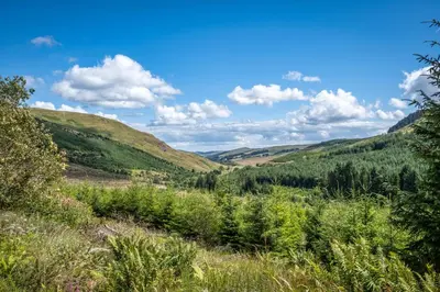 a view of a valley in the hills at High Auchenbrack in Thornhill
