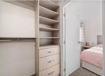 a bedroom with a bunk bed and a closet at Rivers Edge in Dollar