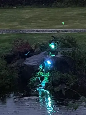 a traffic light with blue and green lights at Red Squirrel Pod with Hot Tub in Oban