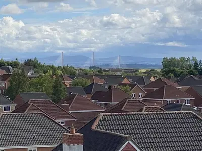 a group of roofs in a residential neighborhood at Prime Duloch Bridge View by TBA in Dunfermline