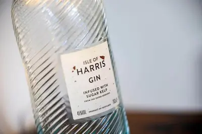 a bottle of water with a label on it at Blar Cottage (Private Sauna + Fast Starlink Wifi) in Hayfield