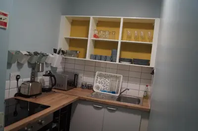 a kitchen with a sink and a counter top at Garnock 2 in Beith
