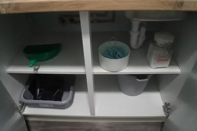 a kitchen shelf with a sink and a bowl at Garnock 3 in Beith