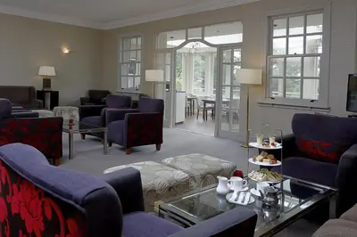 a living room with couches and chairs and a table at Best Western Plus Dunfermline Crossford Keavil House Hotel in Dunfermline