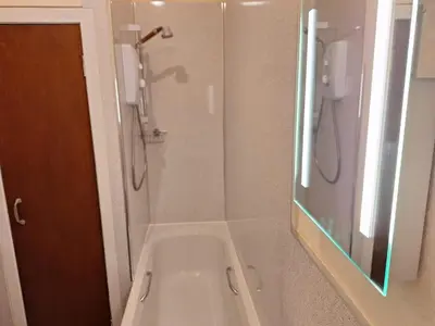 a bathroom with a shower and a toilet in it at Ocean View in Campbeltown