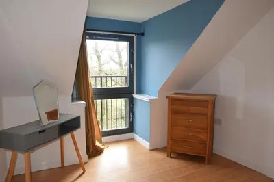 a room with a desk and a window at The Byre at Drumachro in Isle of Gigha