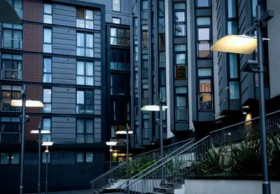 a group of tall buildings with stairs in front of them at VCity ApartHotels Glasgow Central in Glasgow