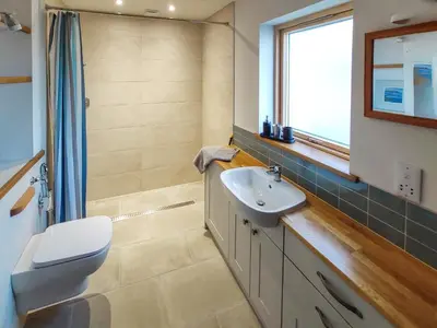 a bathroom with a sink and a toilet at Tulamain in Ardfern