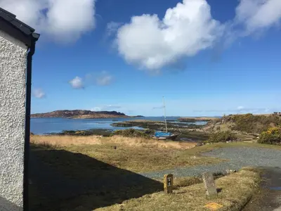 a view of the ocean from a house at Rhumhor in Bunessan