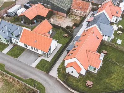 an overhead view of a group of houses with orange roofs at Pride Of Erin - Uk45929 in Linlithgow