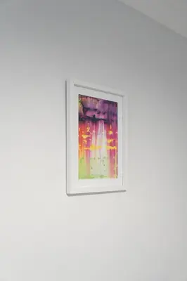 a picture in a white frame on a white wall at Kirkview Apartment in Kirk of Shotts