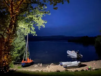 a couple of boats on the shore of a lake at Cameron North Lodge in Alexandria