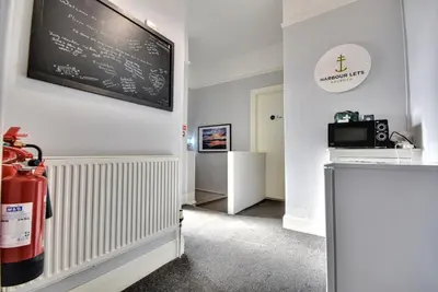 a room with a chalkboard on the wall at The Kempock in Gourock