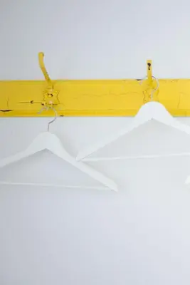 a yellow shelf with two white umbrellas on it at MHOR 84 in Kingshouse