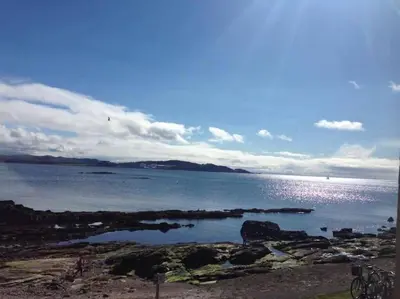 a view of a large body of water at Millport Beach Apartment, Crichton St, sea views in Millport