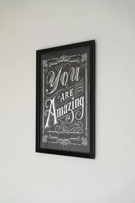 a framed picture of a sign on a wall at 2 BDR Apt By Caledonia Luxe Stays Short Lets & Serviced Accommodation Bishopton in Bishopton
