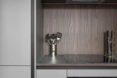 a silver utensil holder on a shelf in a kitchen at Modern George Street Studio sleeping 2 in Edinburgh