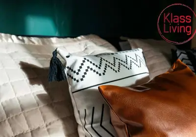 a bed with white pillows and a black and white pillow at Alexander Apartment by Klass Living Coatbridge in Coatbridge