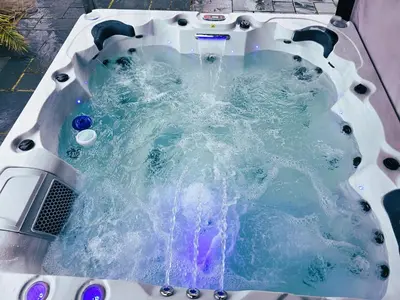 a jacuzzi tub with water coming out of it at Viewpoint Villa - Luxury 4 Bedroom villa with elevated views in Rothesay