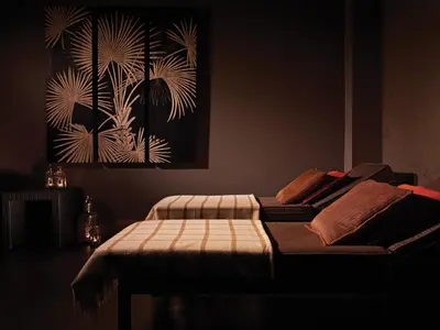 a bedroom with a bed and a painting on the wall at Macdonald Inchyra Hotel & Spa in Falkirk