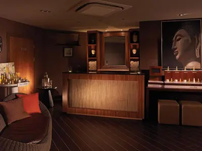 a room with a bar with a bust of a woman at Macdonald Inchyra Hotel & Spa in Falkirk