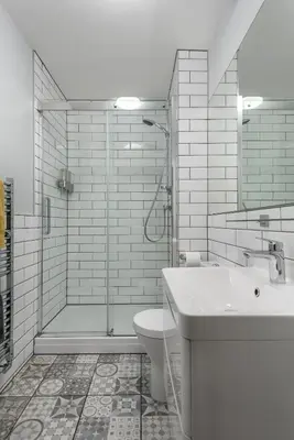 a bathroom with a shower and a sink and a toilet at Rose Apartment in Edinburgh