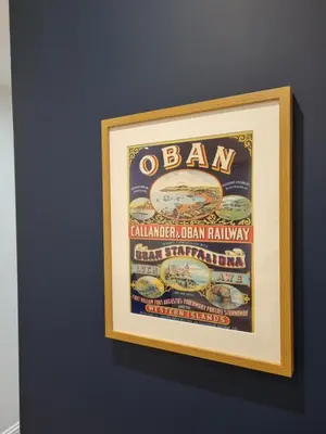 a framed picture of a sandwich on a wall at The Rail & Ferry Den in Oban