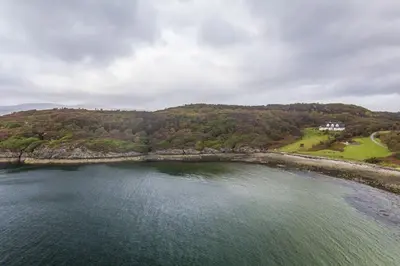 an aerial view of a large body of water at Seal Bay Cottage in Kilfinan