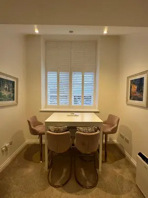 a kitchen with a table and chairs and a window at Luxury Moffat Apartment - High End Furnishing in Moffat